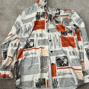 newspaper print button down